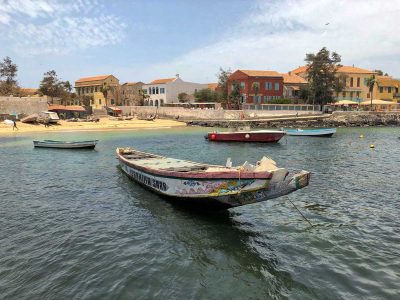 Boats and beach on Goree Island Senegal